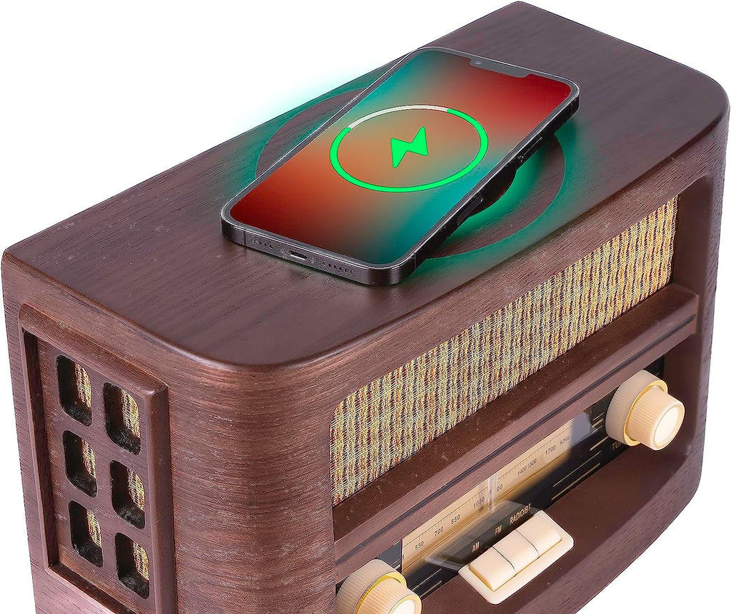 Vintage radio with top phone dock and wireless charging indicator on screen