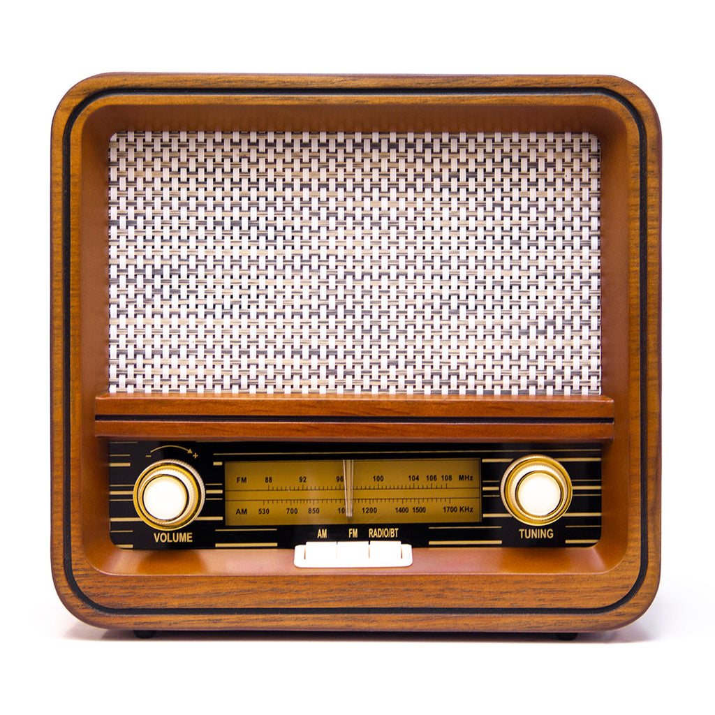 Wooden retro radio with white speaker grille, volume and tuning knobs