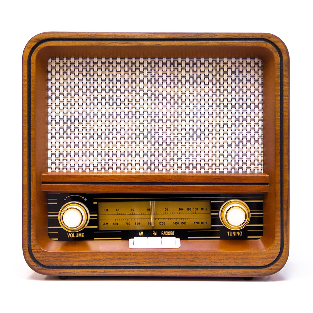 Wooden retro radio with white speaker grille, volume and tuning knobs