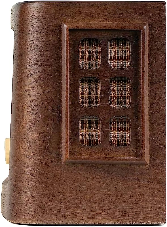 Vintage radio back panel with grille vents in a square grid pattern